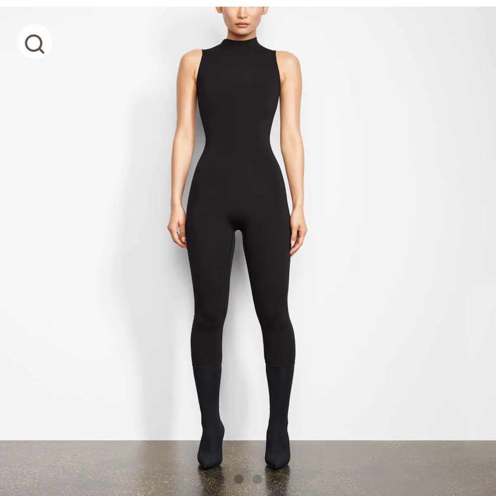 NWT Skims  black sleeves mock neck onesie size lrg
